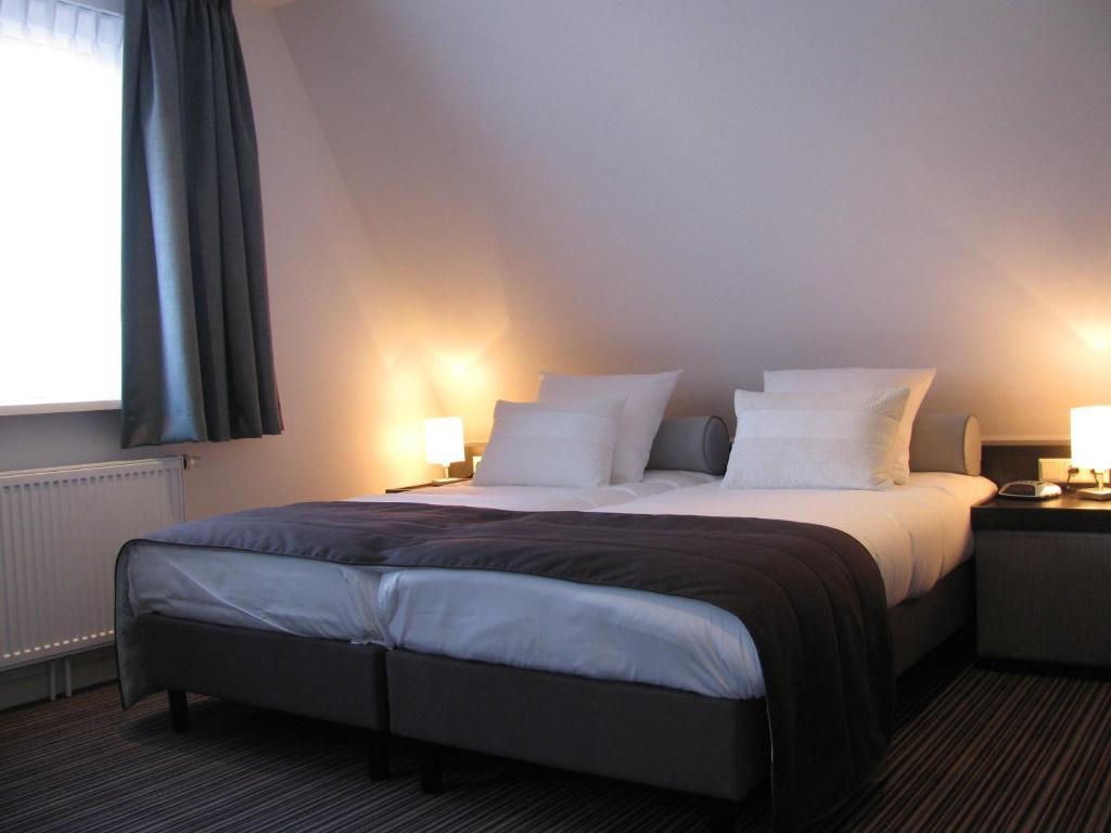 Boutique Hotel De Zwaluw De Koog (Texel) Quarto foto